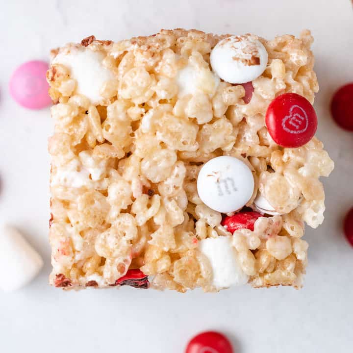 Ariel view of a rice krispie treat with chocolate candies.