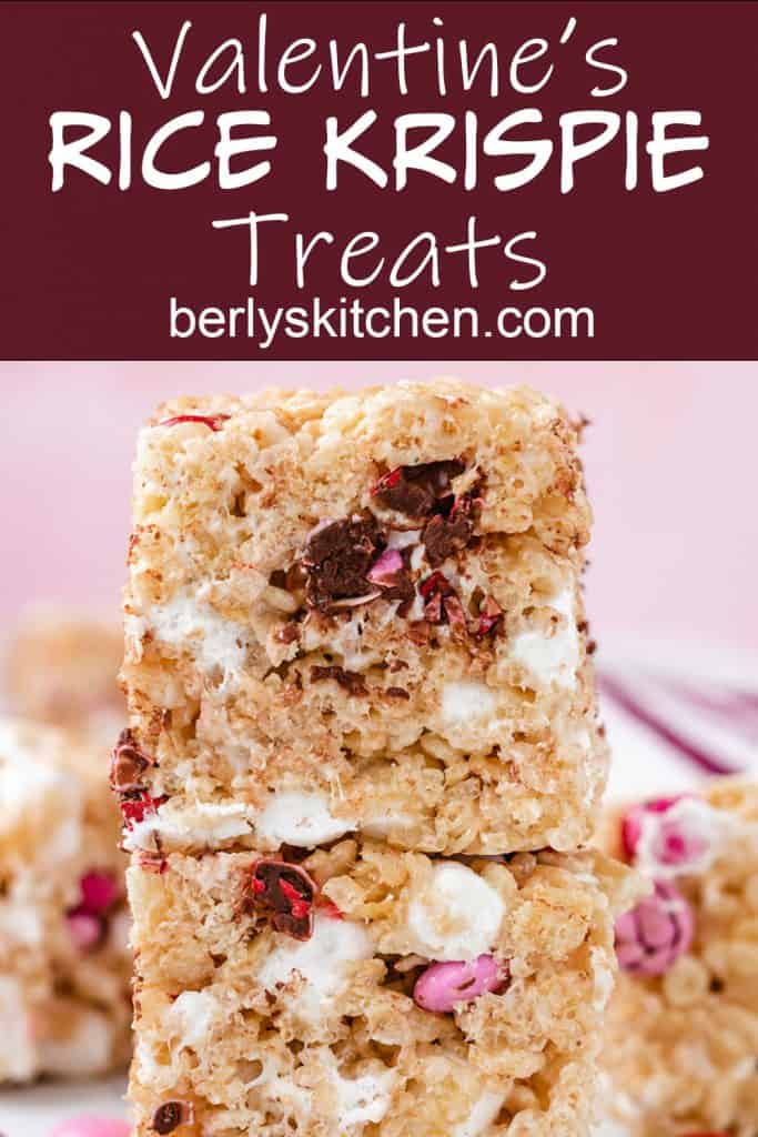 Two rice krispie treats with chocolate chips stacked.
