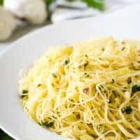 Angel hair pasta with red pepper flakes and parsely.