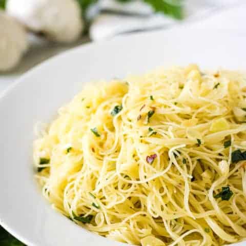 Angel hair pasta with red pepper flakes and parsely.