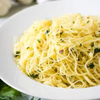 Angel hair pasta recipe with red pepper flakes and parsley.