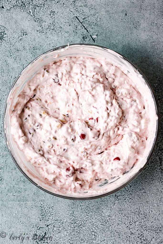 Top down view of cherry fluff in a glass bowl.