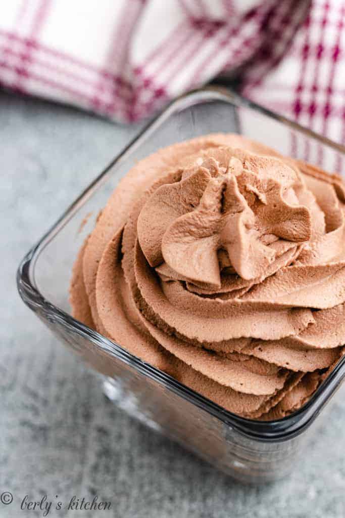 Chocolate whipped cream in a glass dish.