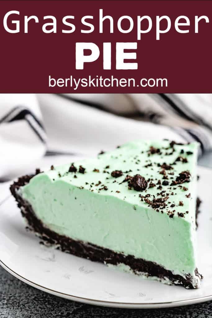 Slice of green pie with cookie crust.