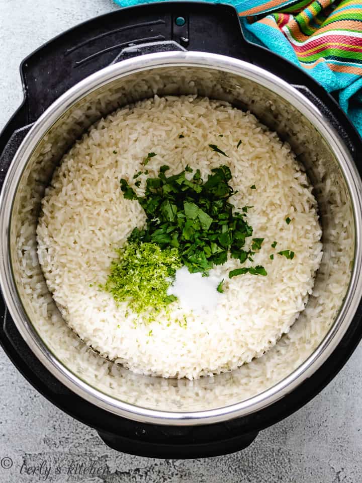 Cooked rice, lime zest, lime juice, and salt in the Instant Pot.