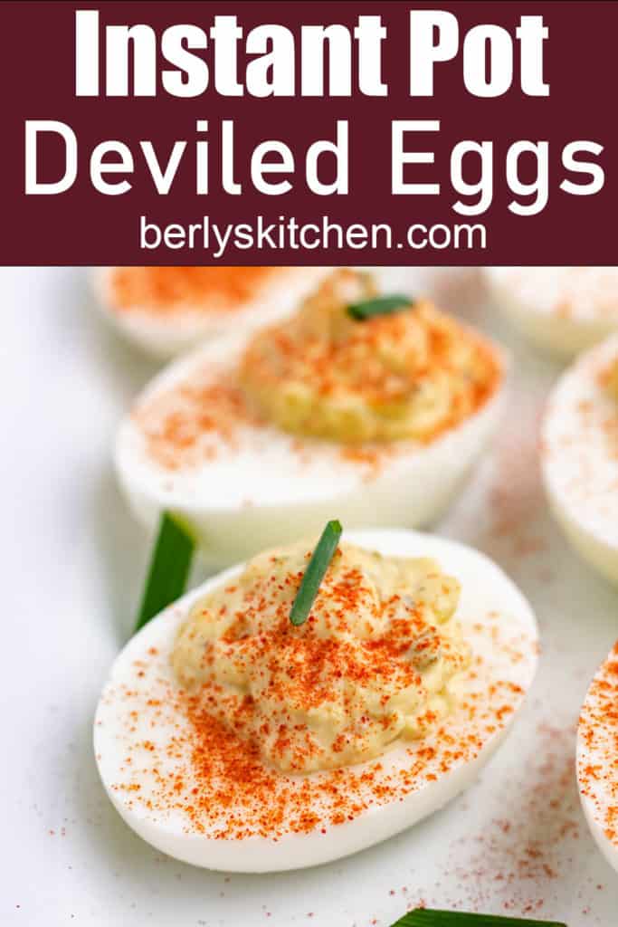 Deviled eggs with paprika and chives.