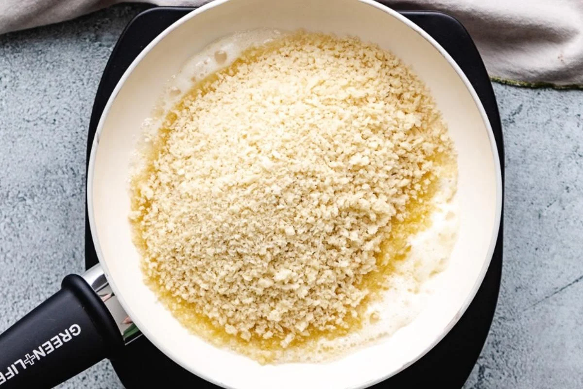 Skillet with panko breadcrumbs.