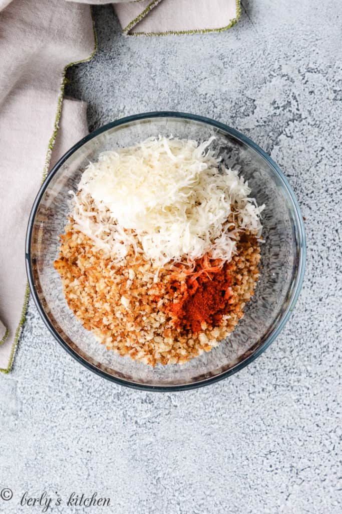 Breadcrumbs, Parmesan cheese, and smoked paprika in a bowl.