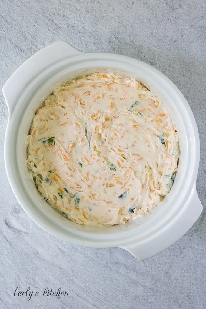 Top down view of jalapeno popper dip in a dish.