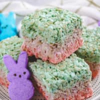 Pile of Easter rice krispie treats on a white dish.