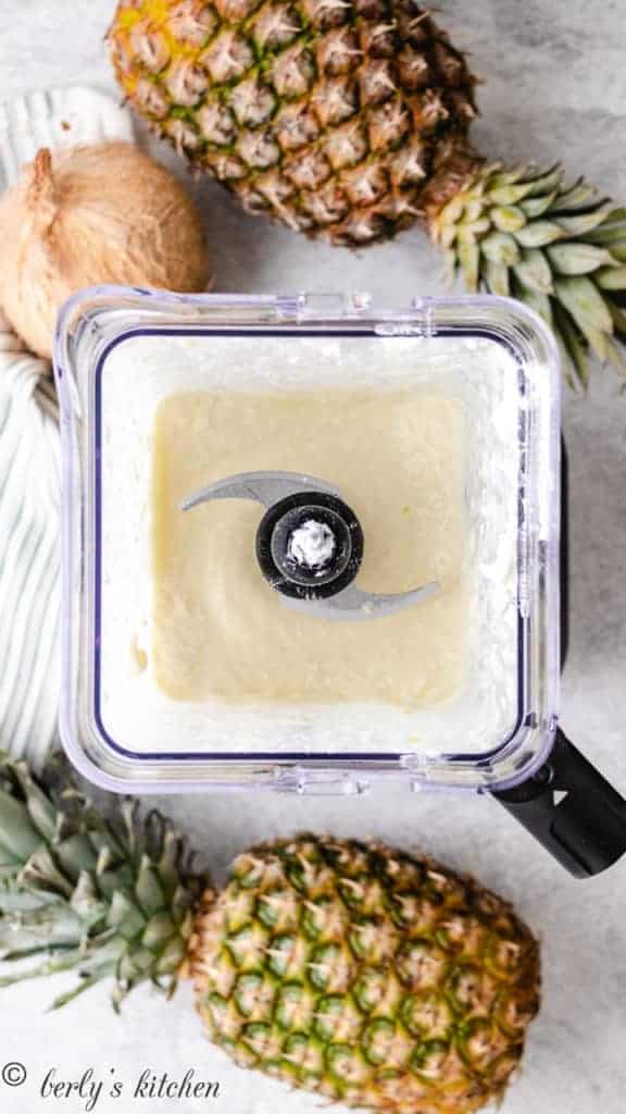 Top down view of a smoothie in a blender.