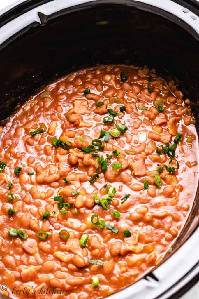 Close up of baked beans in a crockpot.
