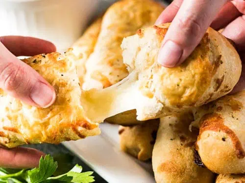 Cheesy breadstick with marinara dipping sauce.