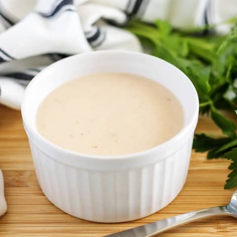 Cream of chicken soup substitute sitting in a white ramekin.