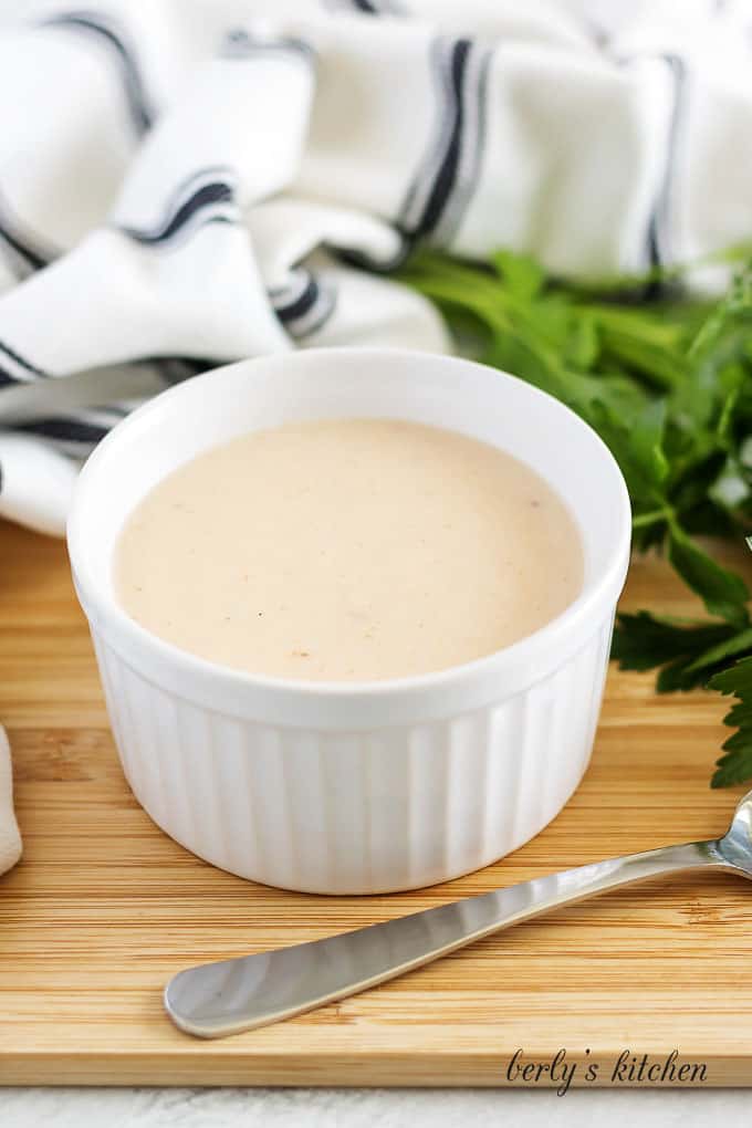 Cream of chicken soup substitute sitting in a white ramekin.