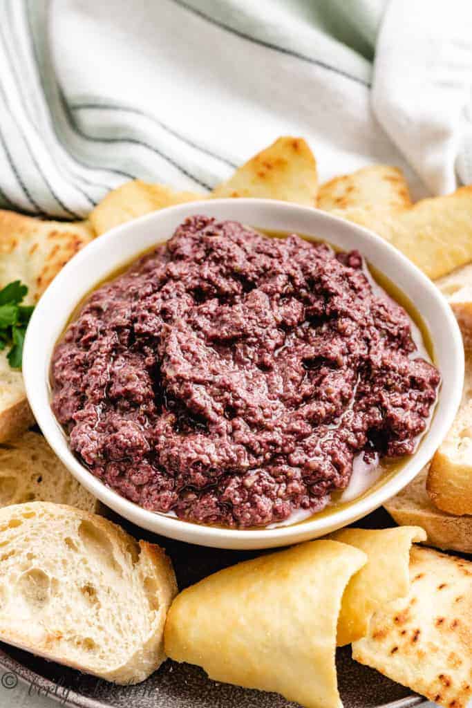 Olive tapenade with toasted bread.