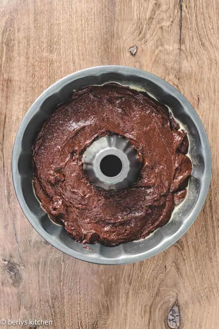 Top down view of cake batter in a bundt pan.