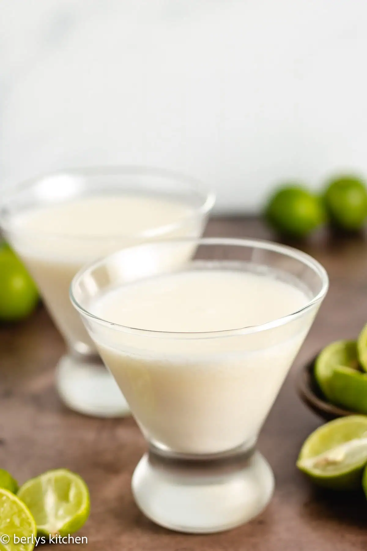 Two glasses filled with key lime martini.