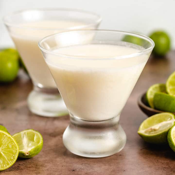 Key Lime Martini Two key lime drinks with cream.