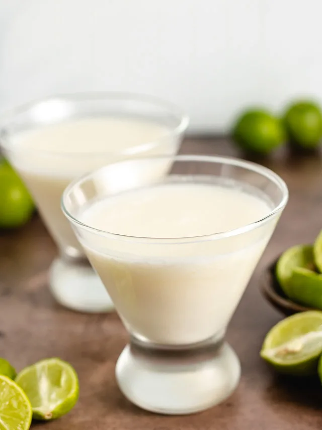 svg%3E svg%3E Cocktail in martini glasses. Key Lime Martini Cocktail svg 3E