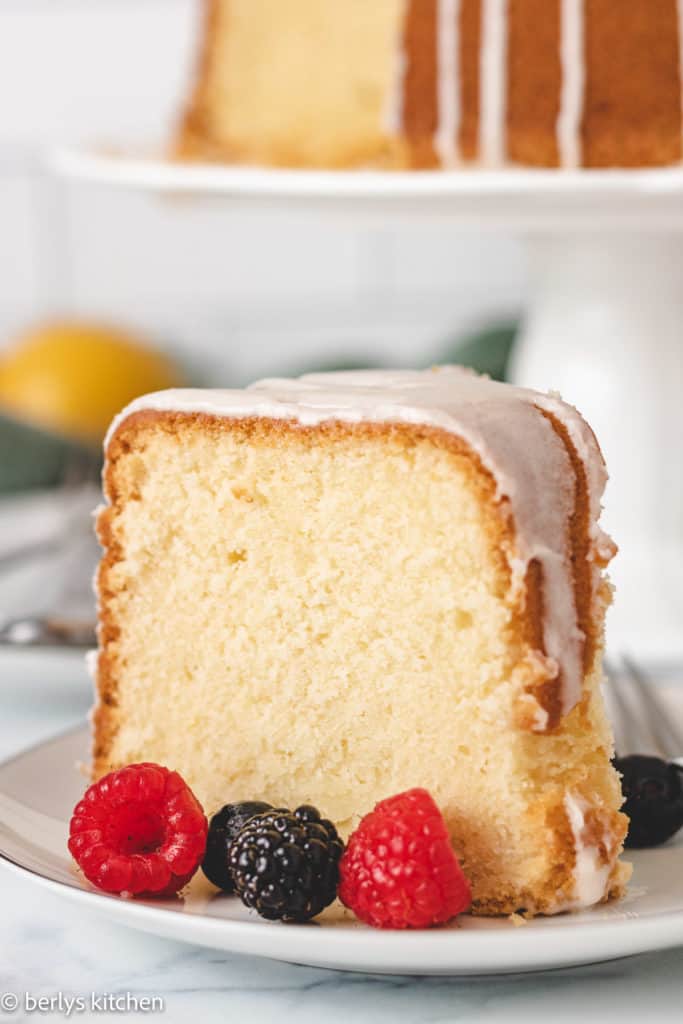 Slice of pound cake on a white dish.