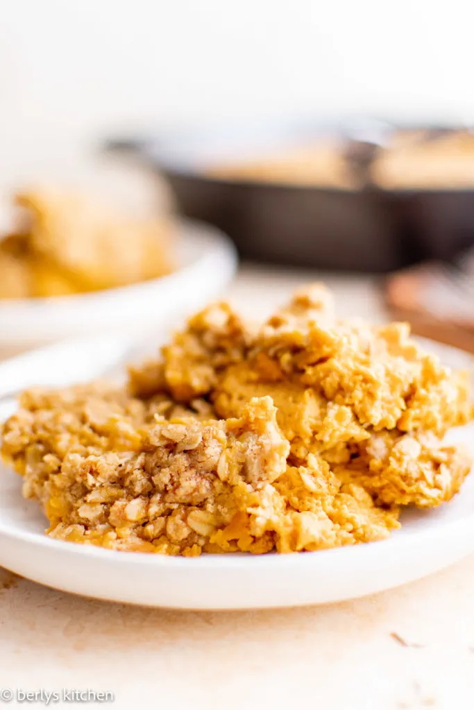 Pumpkin crisp on a white plate.
