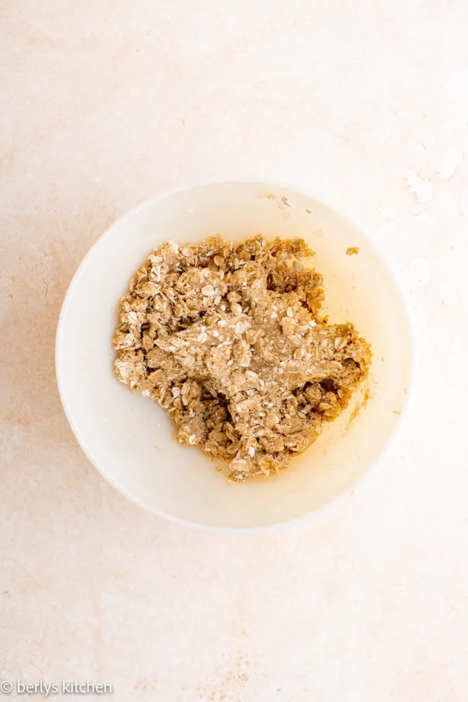 Top down view of crisp topping in a bowl.