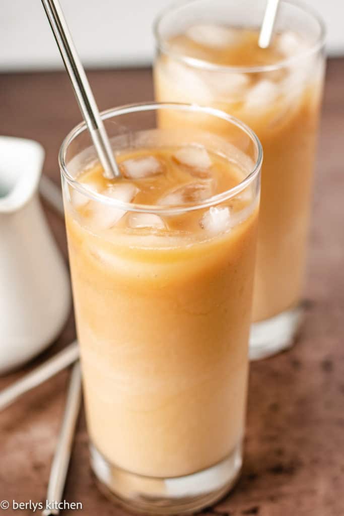 Top down view of caramel coffee over ice.