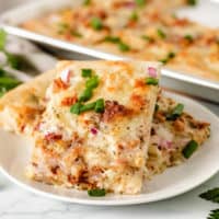 Chicken bacon ranch pizza on a plate.