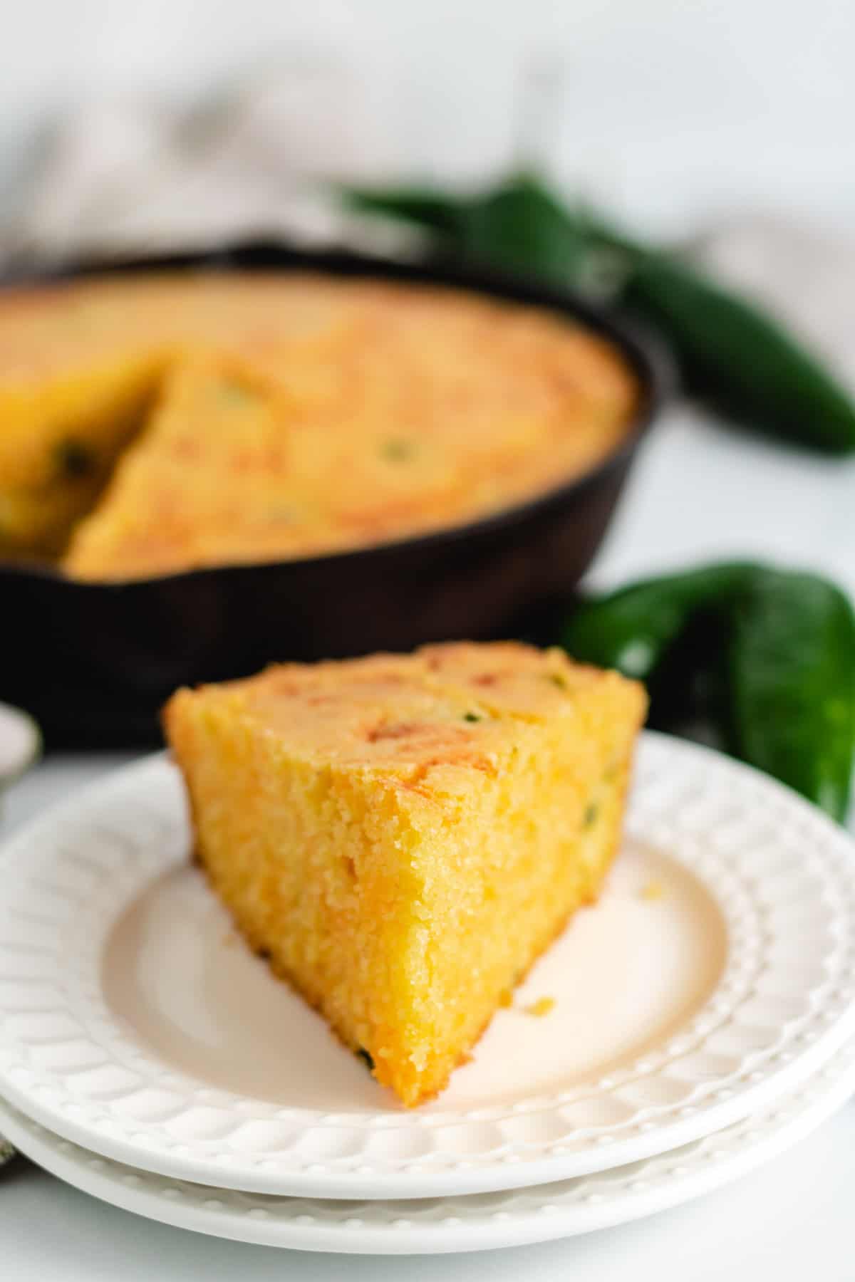 Slice of jalapeno cornbread on a plate.