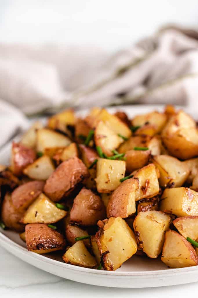Close up view of onion soup potatoes with fresh parsley.