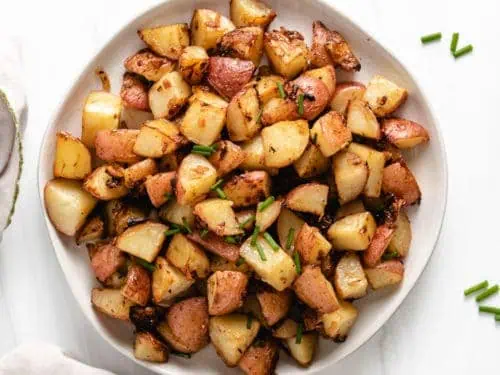 Top down view of diced red potatoes.
