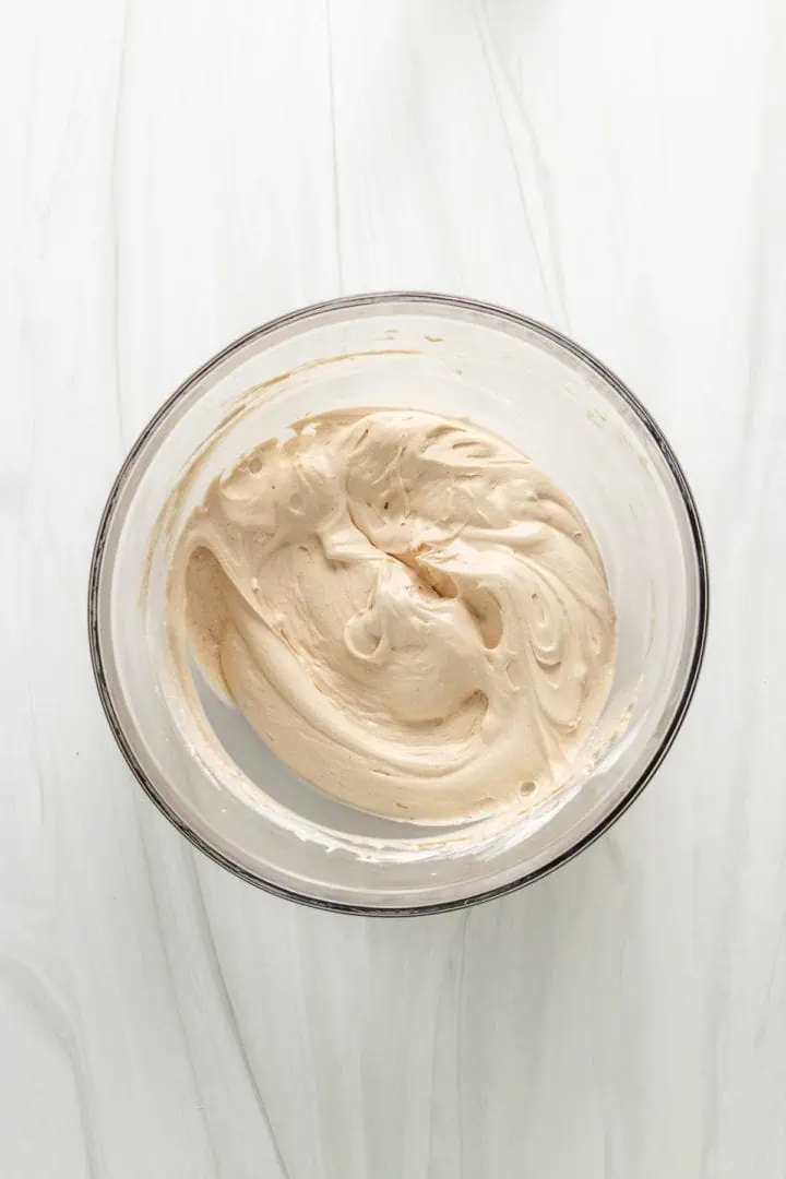Top down view of peanut butter filling in a bowl.