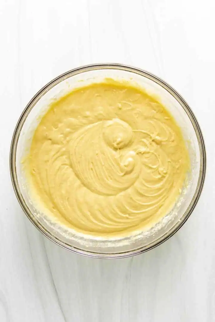 Top down view of cupcake batter in a bowl.