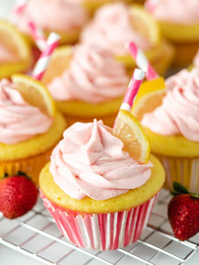 Lemonade cupcakes in pink and white liners.