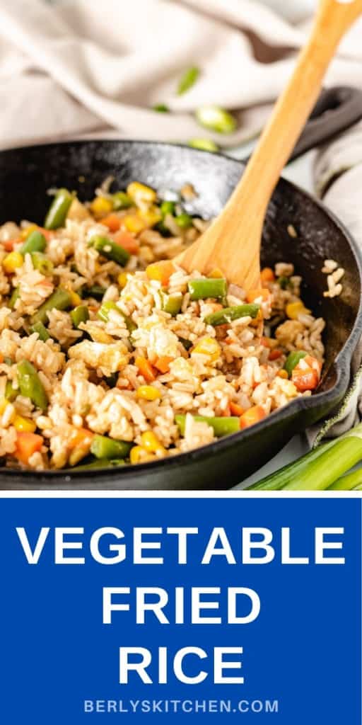 Vegetable fried rice in a cast iron skillet.