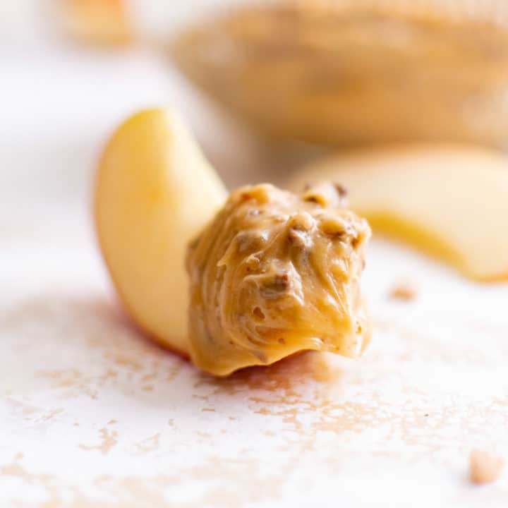 Caramel Apple Dip Apple slice dipped in caramel dip.