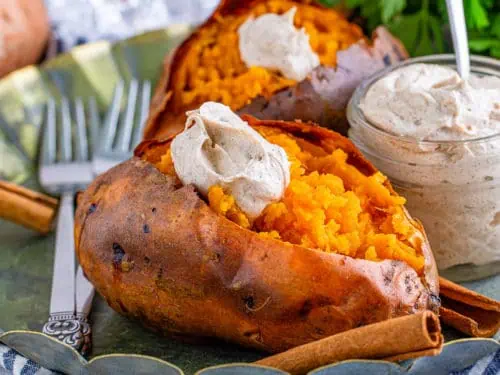 Potatoes with cinnamon butter on a plate.