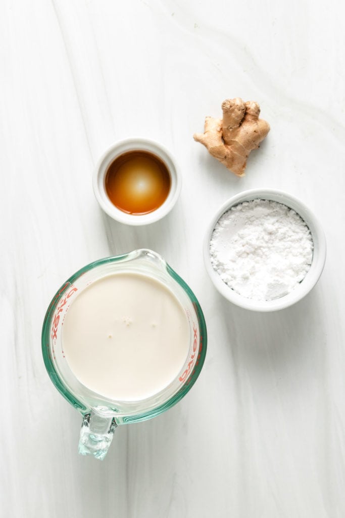 Top down view of ingredients for ginger whipped cream.