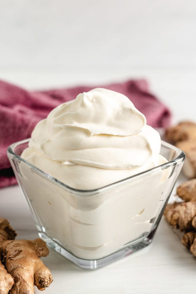 Ginger whipped cream in a glass dish.