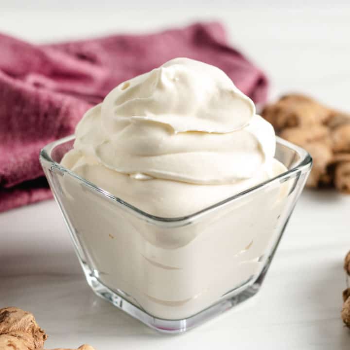 Ginger Infused Whipped Cream Ginger infused whipped cream in a serving dish.
