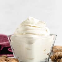 Glass dish filled with ginger whipped cream.