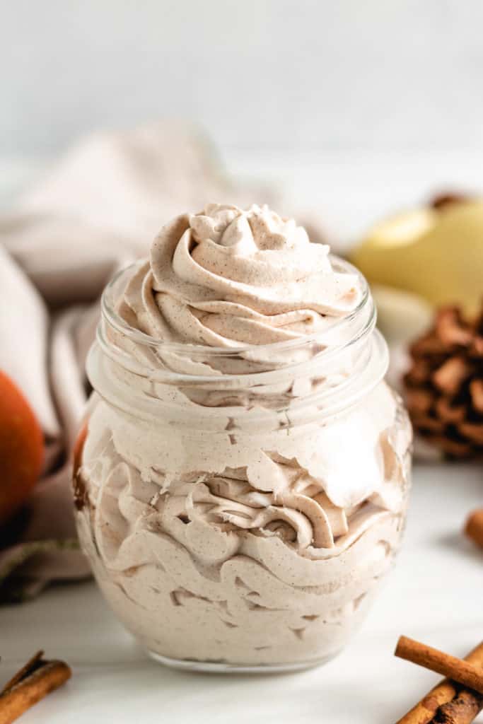 Mason jar filled with spiced whipped cream.