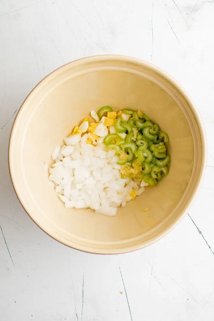 Veggies and egg in a large bowl.