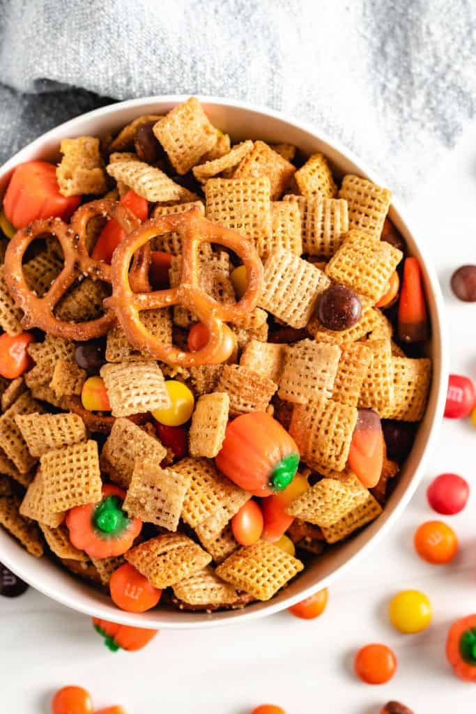 Top down view of halloween snack mix in a bowl.