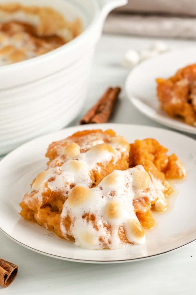 Sweet potato casserole topped with marshmallows.