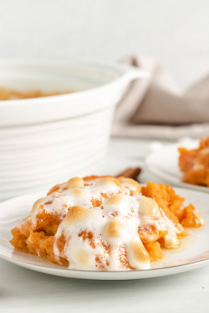 Scoop of sweet potato casserole on a plate.