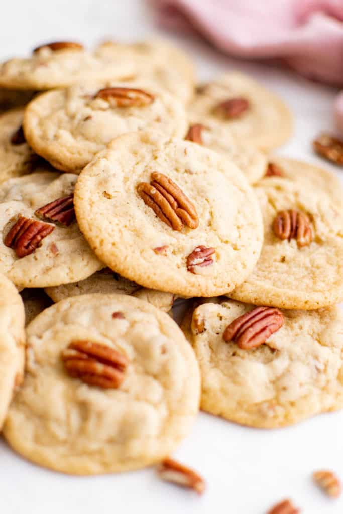 Butter pecan cookies in a pile.