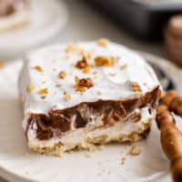 Slice of chocolate lasagna with a spoon.