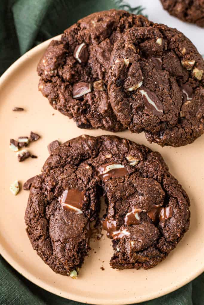 Top down view of a chocolate mint cookie halved.